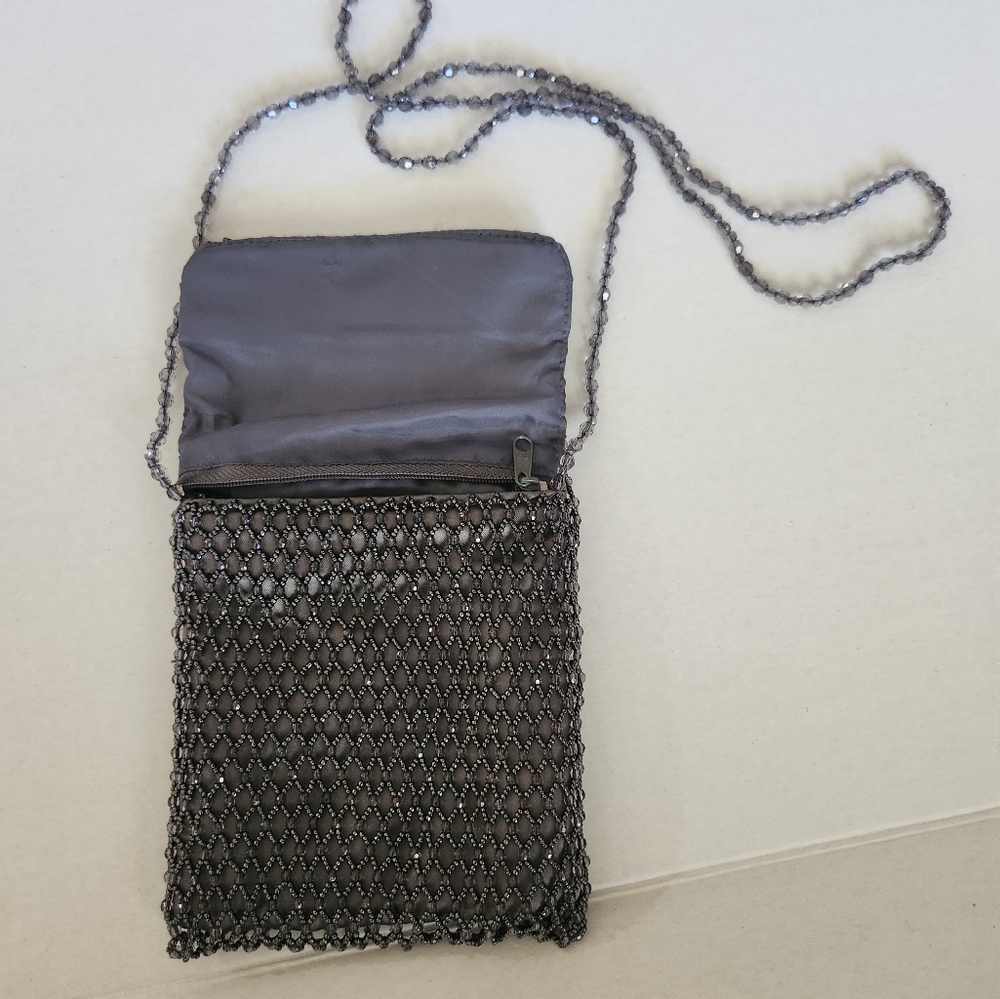 2 gray evening bags.  1 shoulder beaded strap and 1 hand faux leather strap.